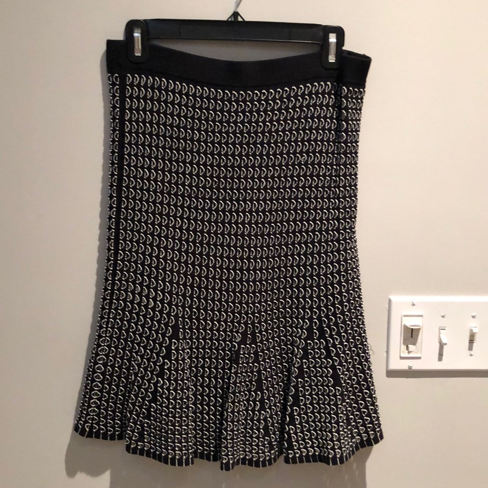 Ann Taylor black skirt with white accent details! New with Tags! Size Medium.